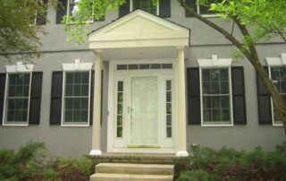 view of front of home with archway